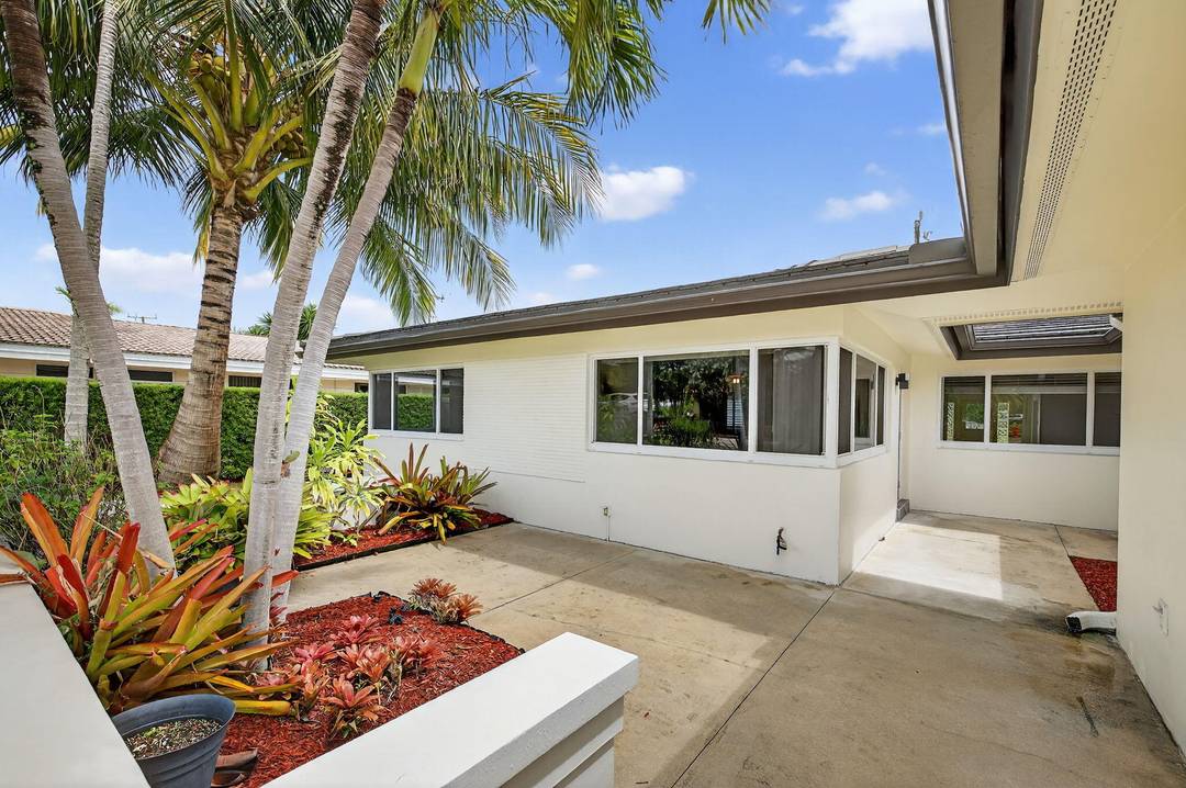 Just minutes to the beach, restaurants and shops this 2 bedroom 2 bath bath duplex features have updated kitchens and baths, plantation shutters, partial impact windows, all freshly painted with ...