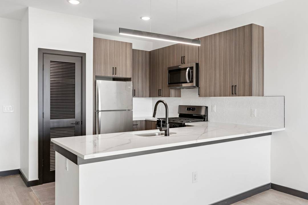 Modern 1 Bed | 1 Bath Apartment with a Rooftop Deck & Parking in the Heart of Jersey City!