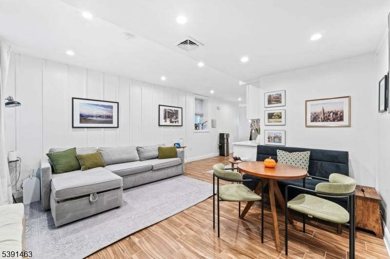 Welcome home to this beautifully renovated 2BR, 2 full bath 1403 sq ft condo ideally located only a 1 2 block off Boulevard East in a prime Weehawken location.