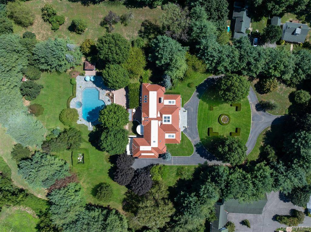 AN EXTRAORDINARY COMPOUND SET ON 16 ACRES IN OLD WESTBURY