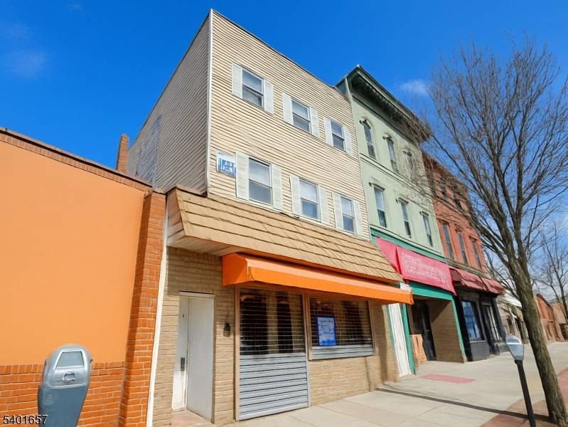 Excellent investment opportunity on Summit Ave in Union City featuring 3 apartments plus ground level commercial space.