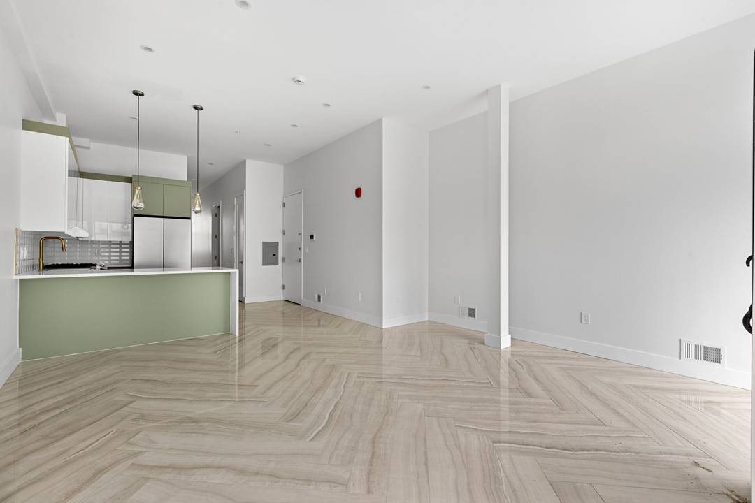 Spacious 2-Bed + Den with Private Entrance & Soaring Ceilings in the Heart of Jersey City!